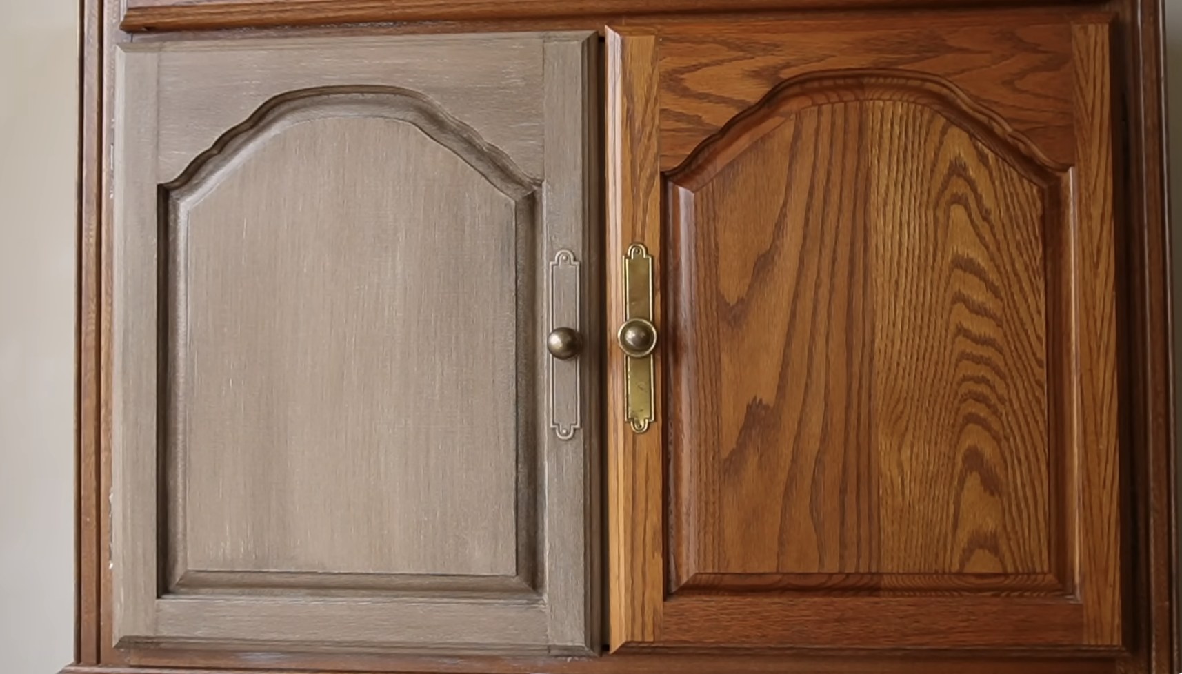 Kitchen cabinets with a faux wood grain finish created using paint and glaze